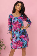 Numoco 323-2 Comfortable oversized dress with ties on the sleeves - colorful flowers