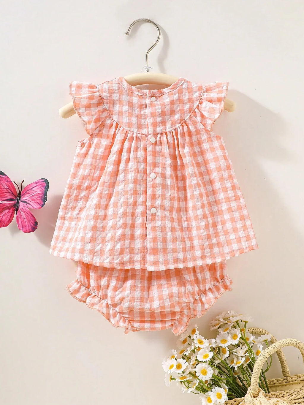 Newborn baby girl two-piece set: white cotton pleated sleeveless checkered top and matching triangular leggings