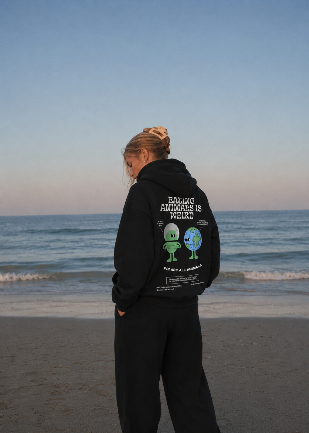 EATING ANIMALS IS WEIRD HOODIE